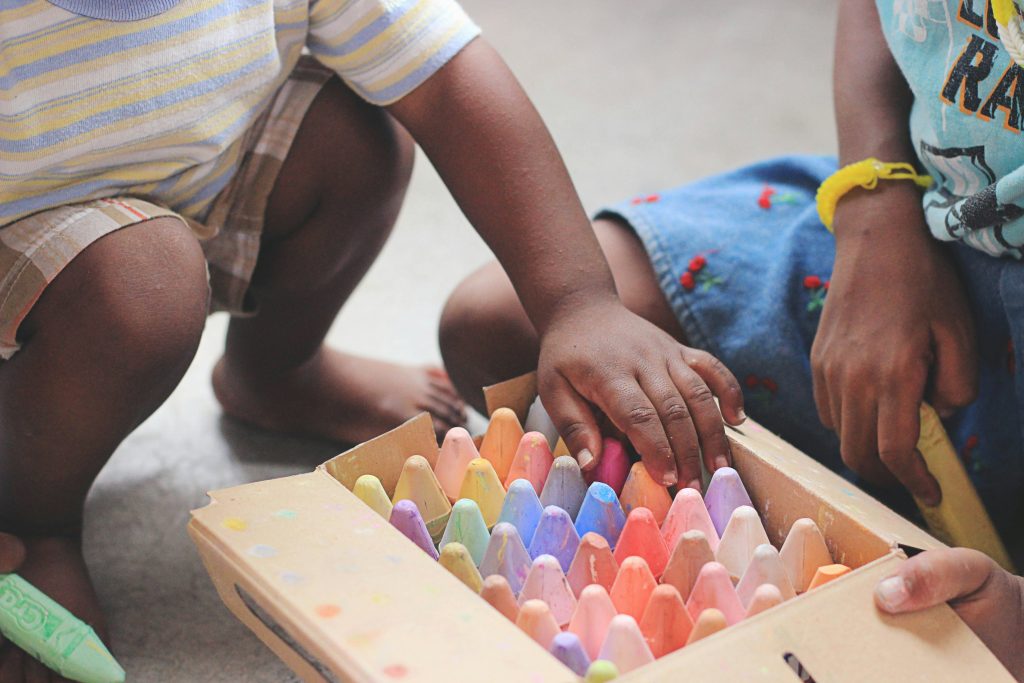 montessori kid choosing own colours